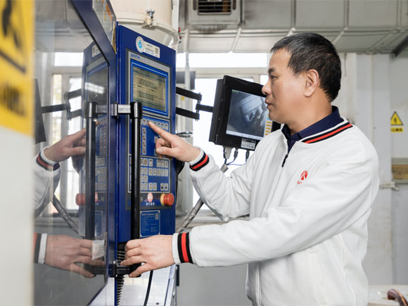 Staff is using inspection machine