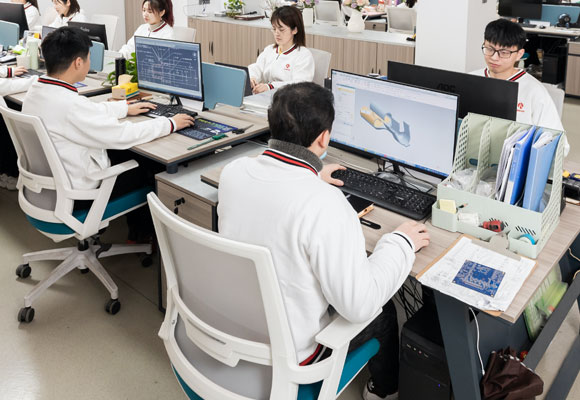 Staff is drawing the sketch on the PC