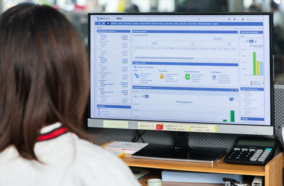 A staff is making budge on PC